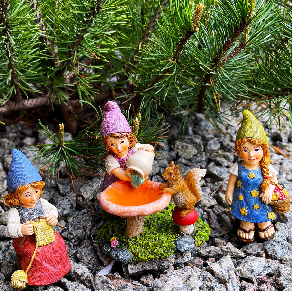 Mood Lab garden gnome lady-7 statue provides a decorative accent for entrance displays.