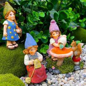 Mood Lab garden gnome lady-9 statue is ideal for indoor display and outdoor decor.