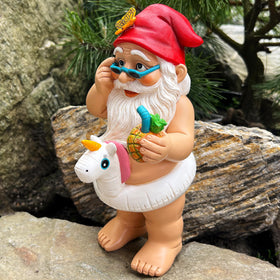 Mood Lab garden gnome in a sunny yard near plants for playful ambiance.