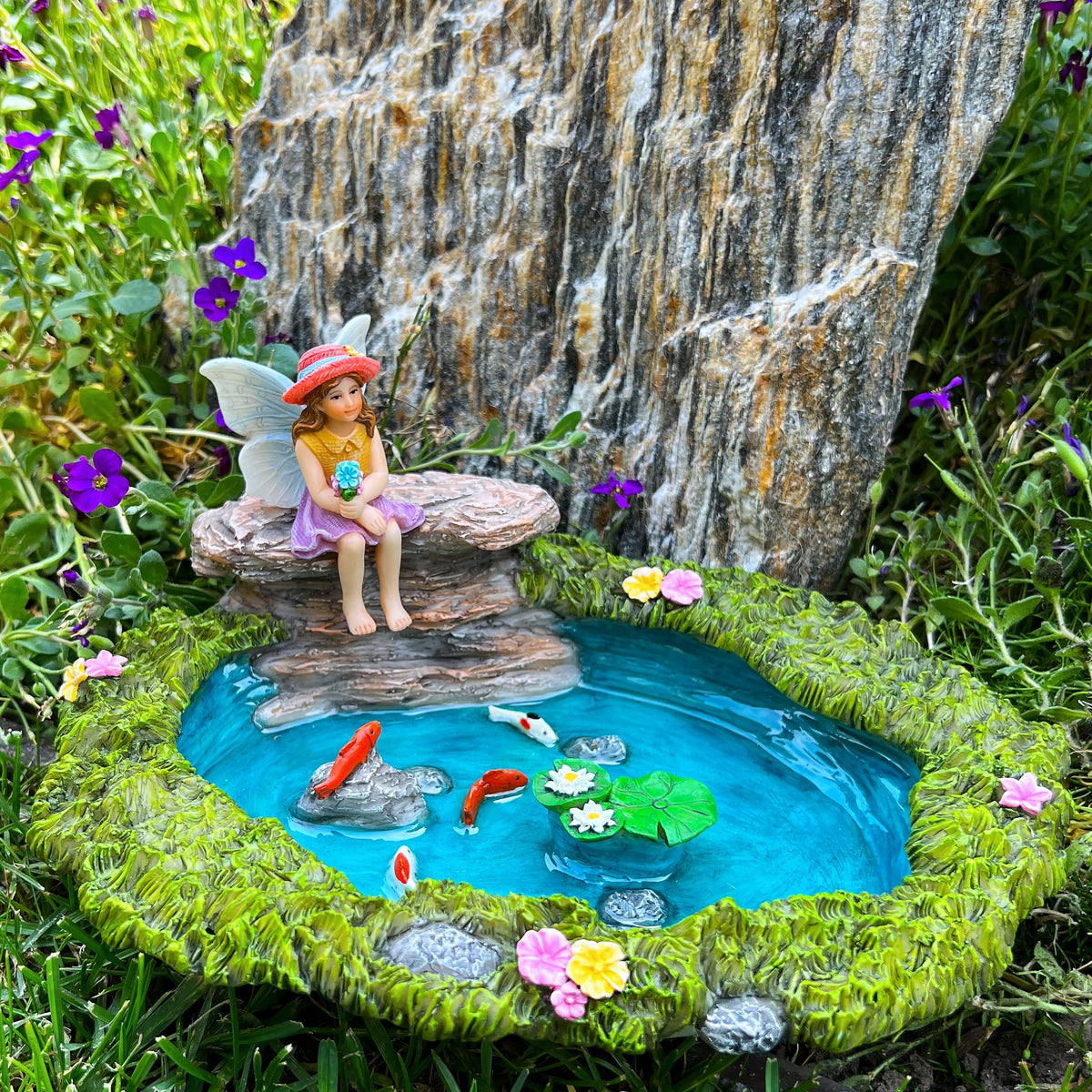Mood Lab miniature statues for shelves, planters, or water features.