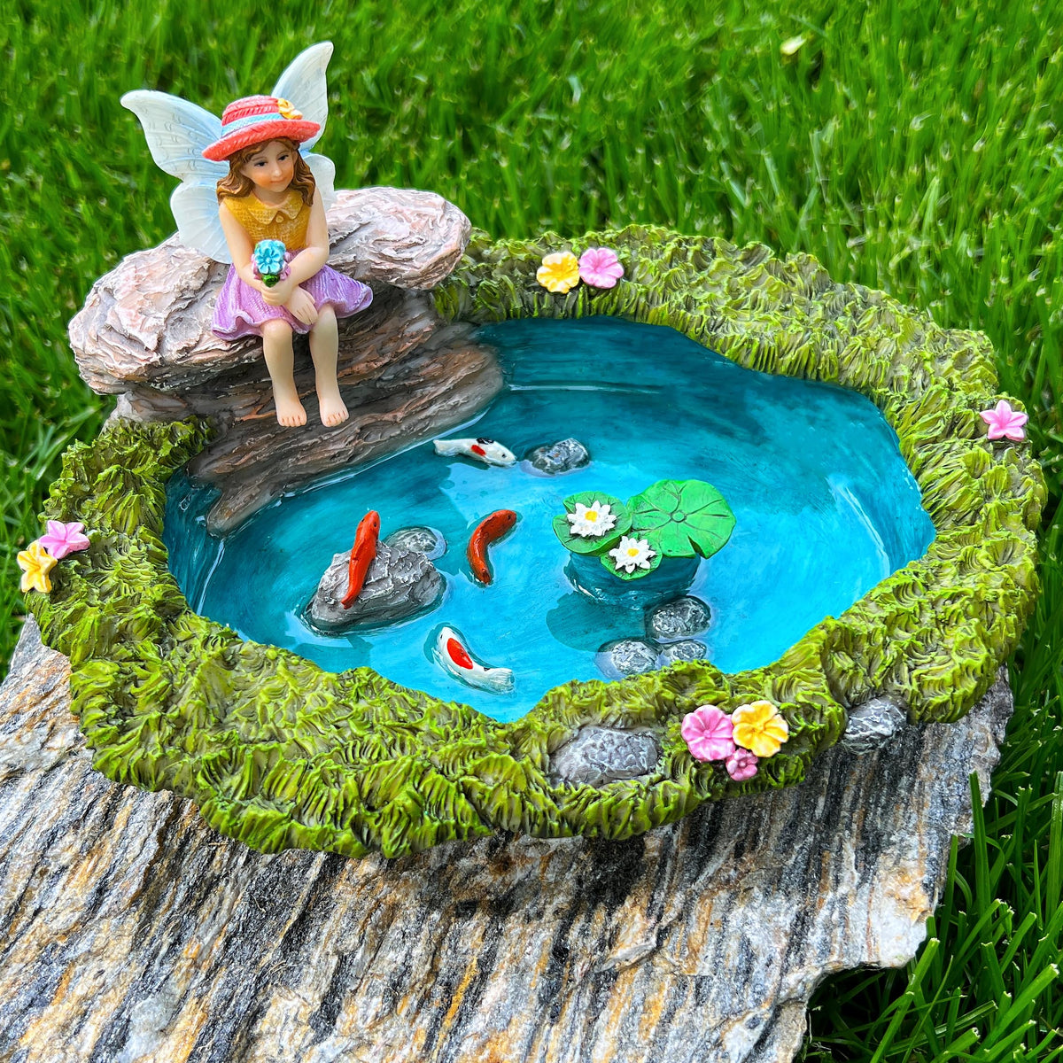 Mood Lab pond-set figurines withstand outdoor display with waterproof finish.