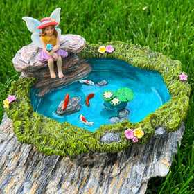 Mood Lab pond-set figurines withstand outdoor display with waterproof finish.