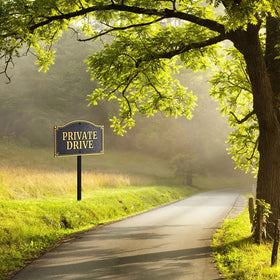 Morgtta private drive sign stake assembly demonstrates easy installation.