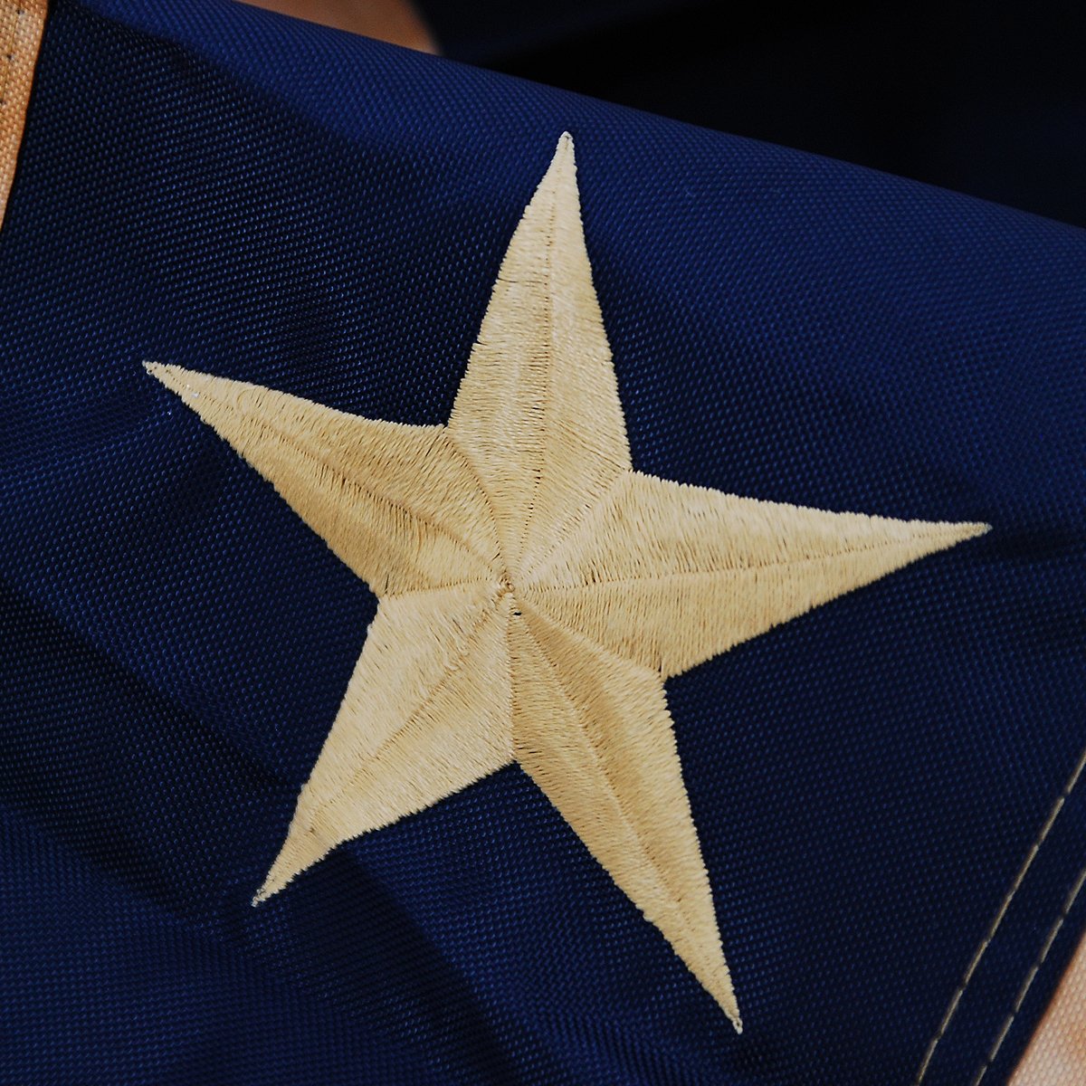 Morigins embroidered stars detail on bunting adds classic Americana flair.