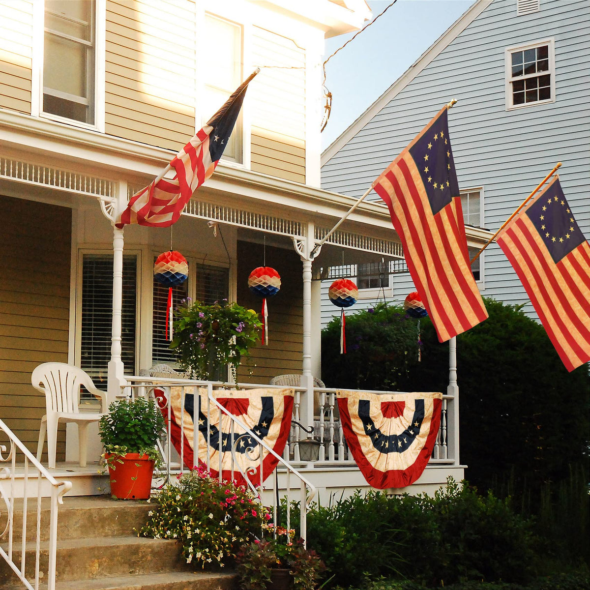 Morigins outdoor porch setup using bunting for seasonal decorations.