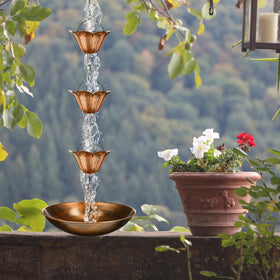 MorningRo rain chain channels water with basin to minimize splashes