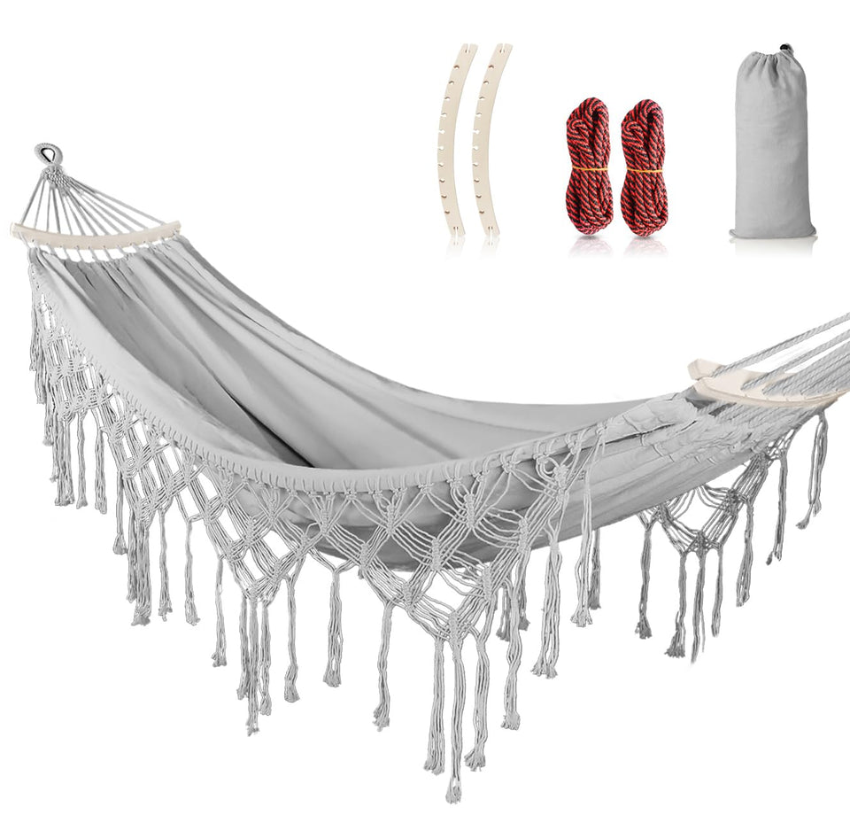 MOSFiATA backyard hammock with tassels enhances outdoor relaxation and style.