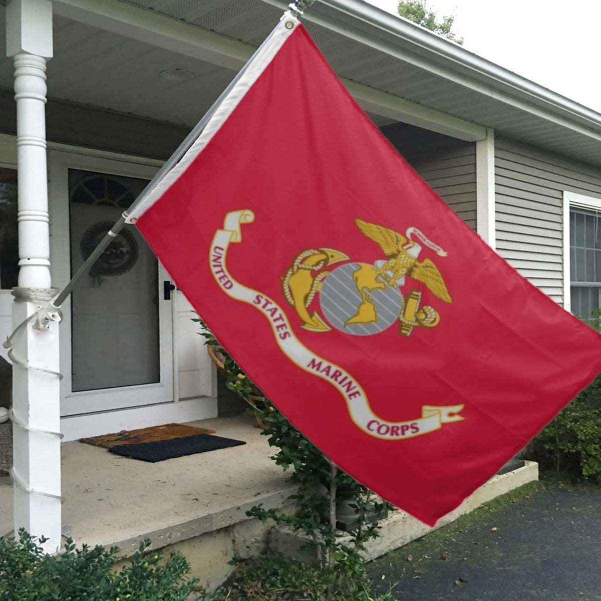Mosprovie USMC flag fluttering on a flagpole for outdoor visibility.