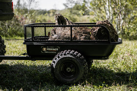 MotoAlliance poly tub trailer shows rugged 18x8 tires ready for varied terrain