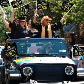 Moukeren black-and-gold design stands out on vehicles during graduations and celebrations