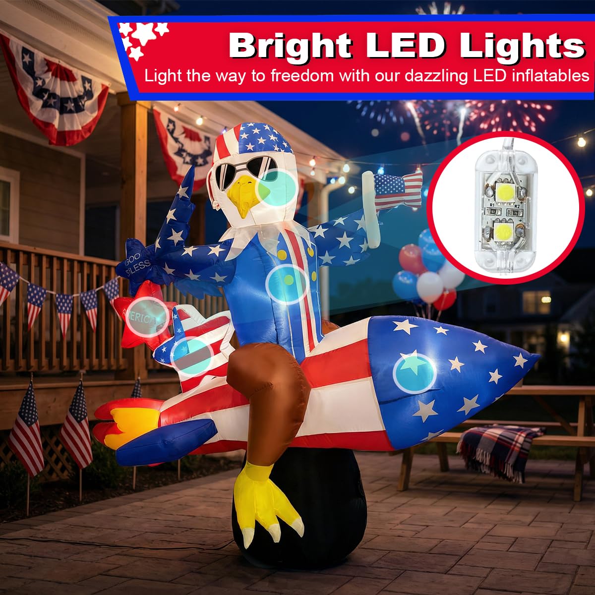 Mowholm LED nighttime display shines with colorful eagle inflatable.