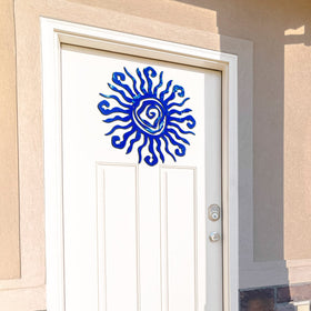 Moxweyeni indoor-outdoor sun wall art in vivid blue.