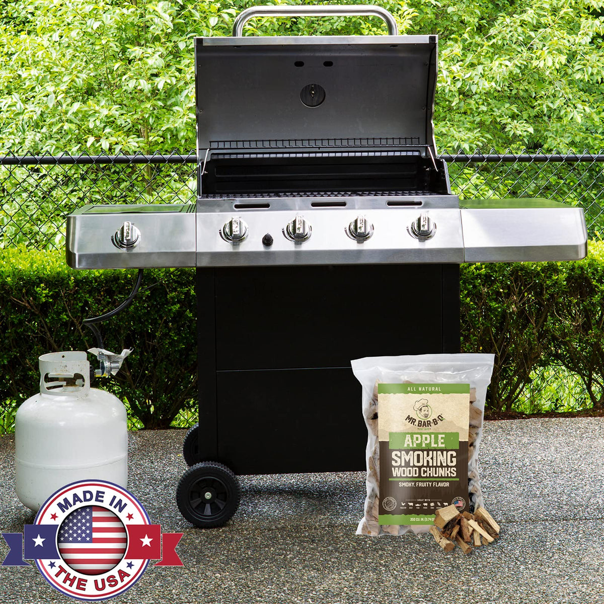 Mr. Bar-B-Q Apple Wood Chunks on a grill delivering aroma and heat