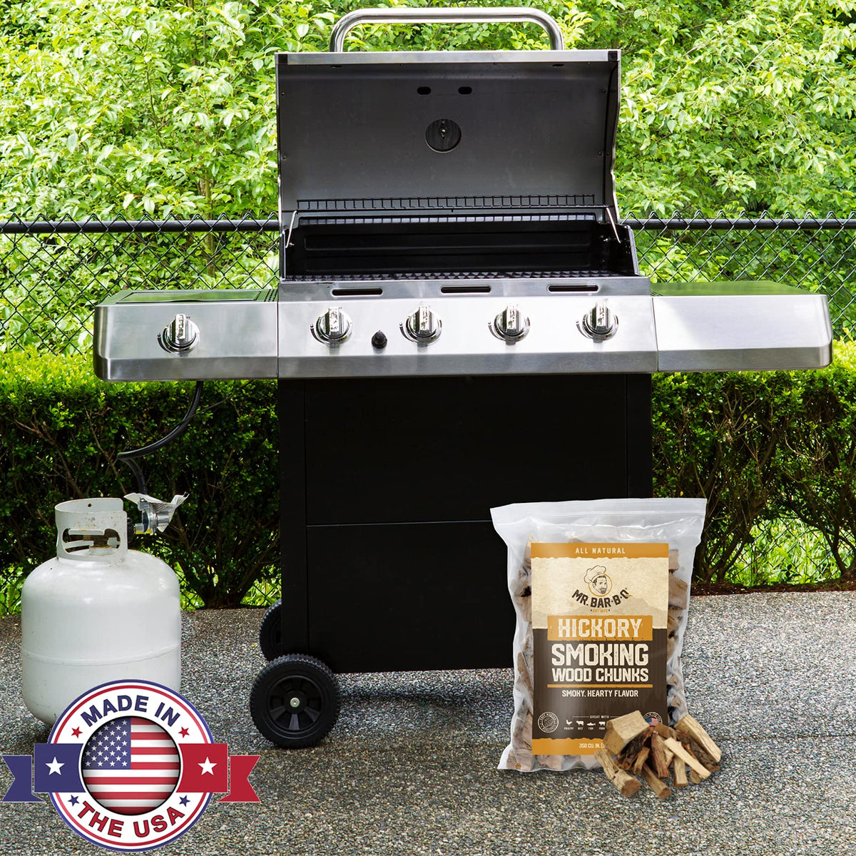 Mr. Bar-B-Q Hickory chunks on grill deliver extended, steady smoke for juicy bites.