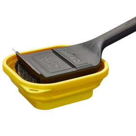 Mr. Bar-B-Q tub with Scrub Daddy submerged for steam cleaning.