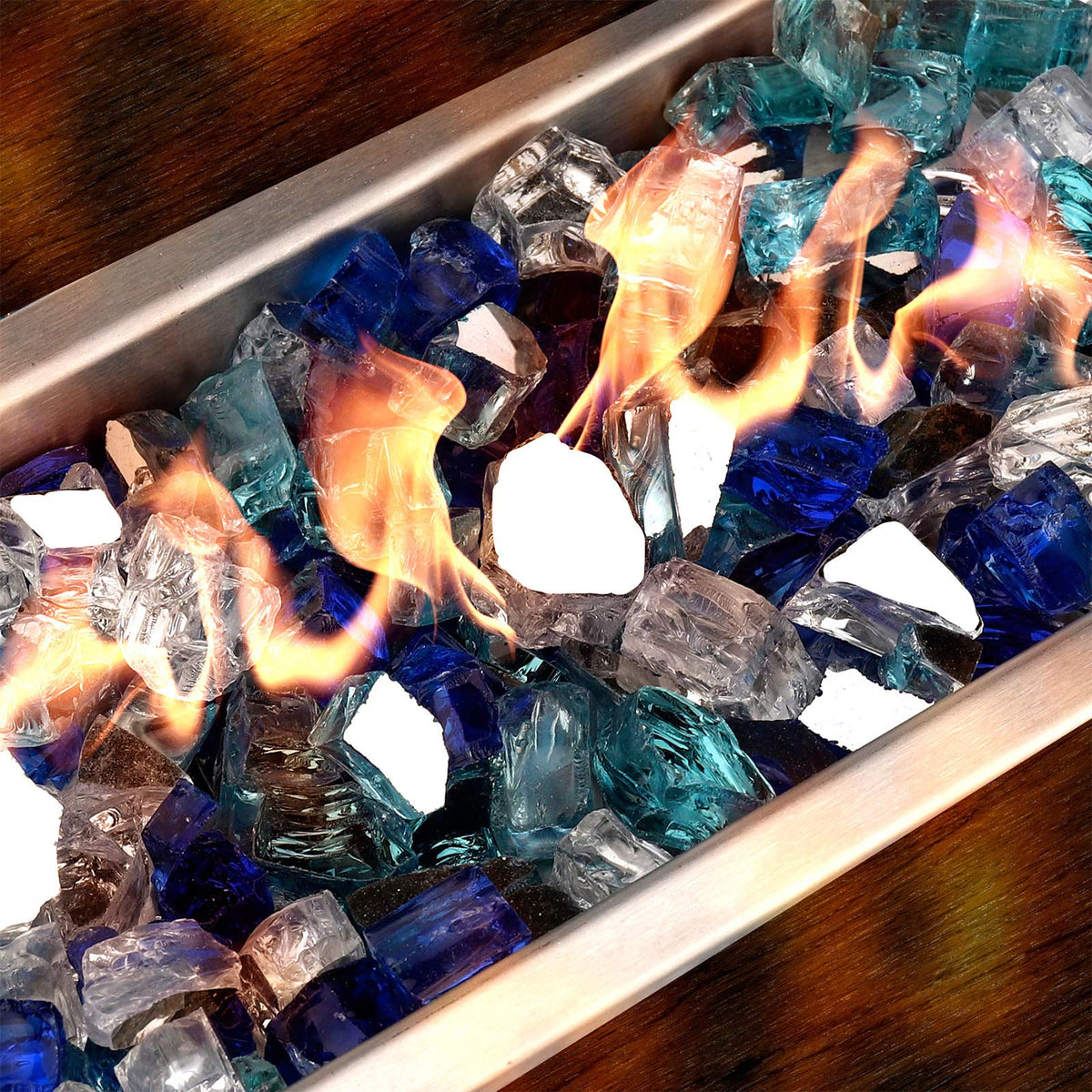 Mr. Fireglass cobalt blue glass adds rich color to outdoor fireplace setup