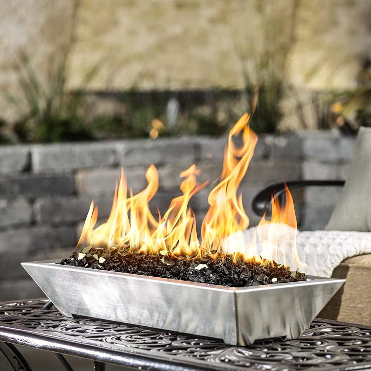 Mr. Fireglass 10 lbs Onyx Black garden decor adds color to outdoor spaces.