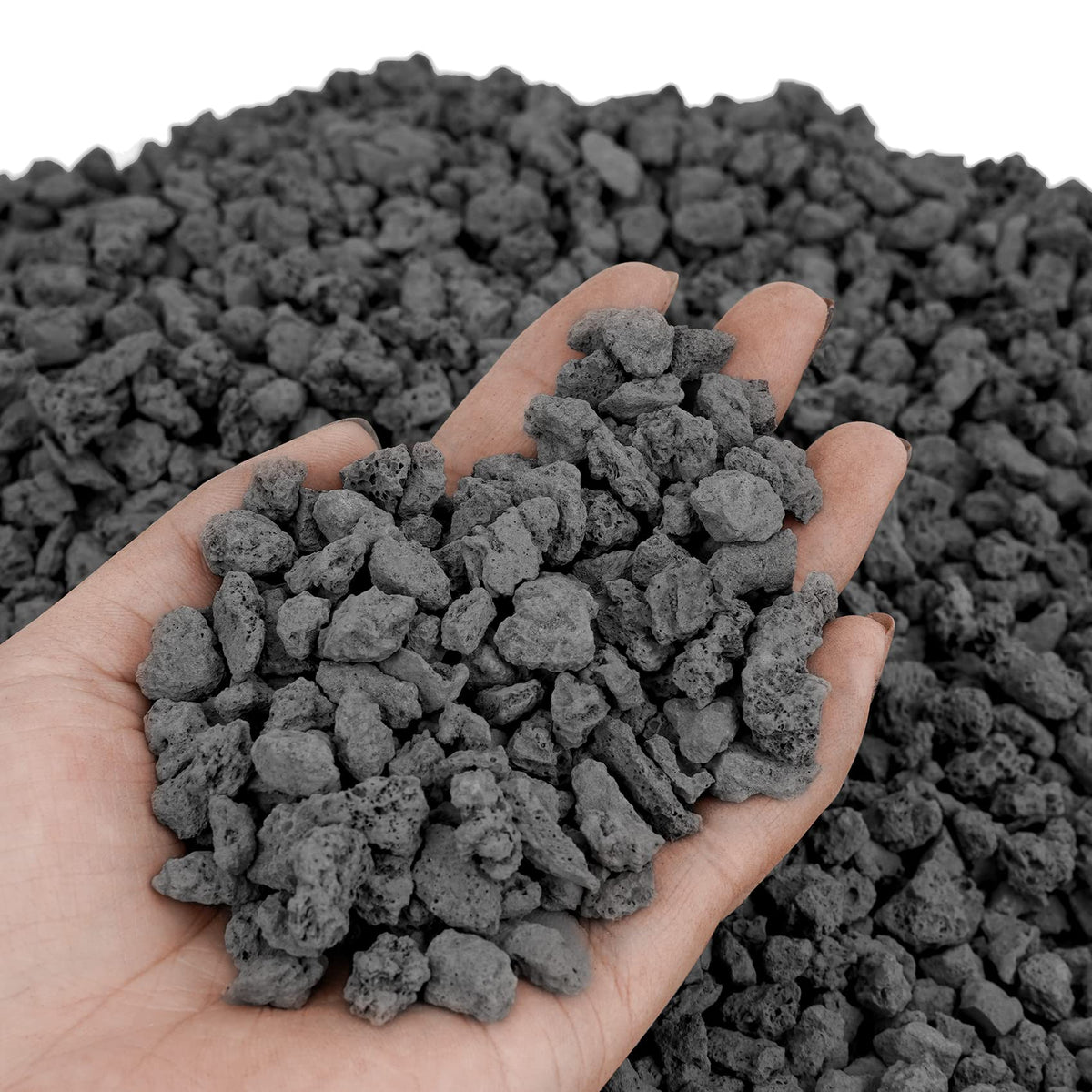 Mr. Fireglass lava rocks enhance garden landscaping with rugged texture