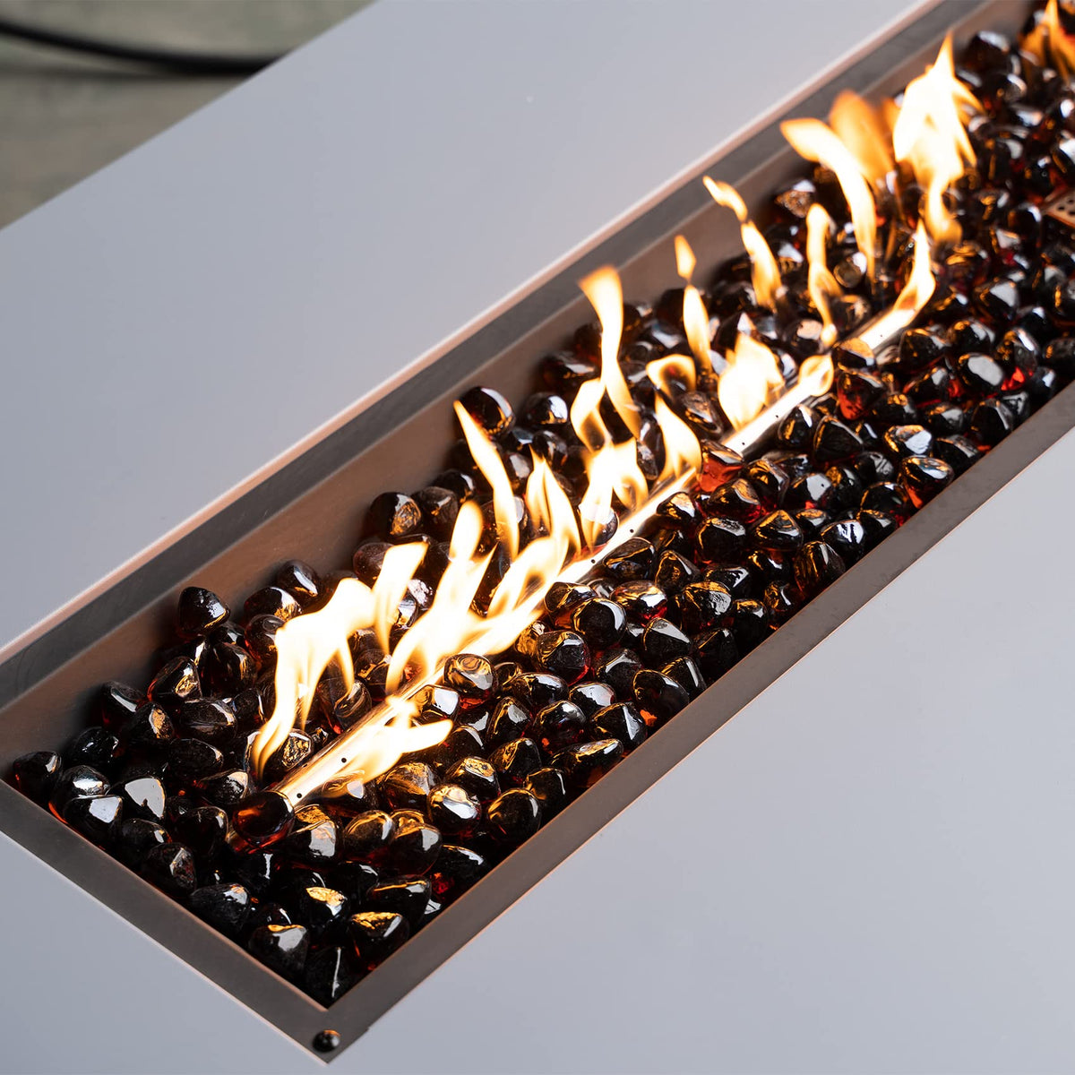 Mr. Fireglass diamond amber glass in fire pit creates clean ambiance
