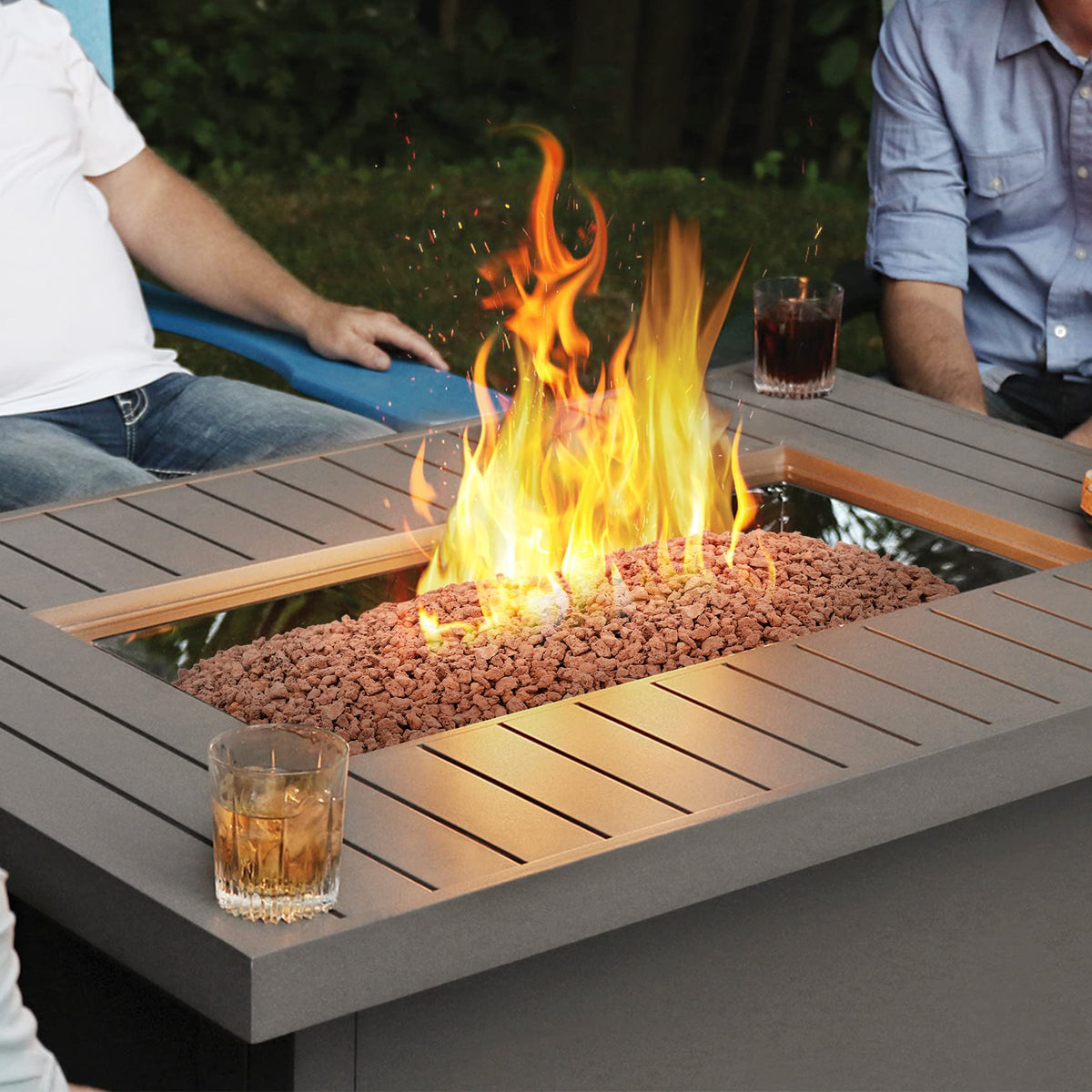 Mr. Fireglass lava rock decorating a garden path and features