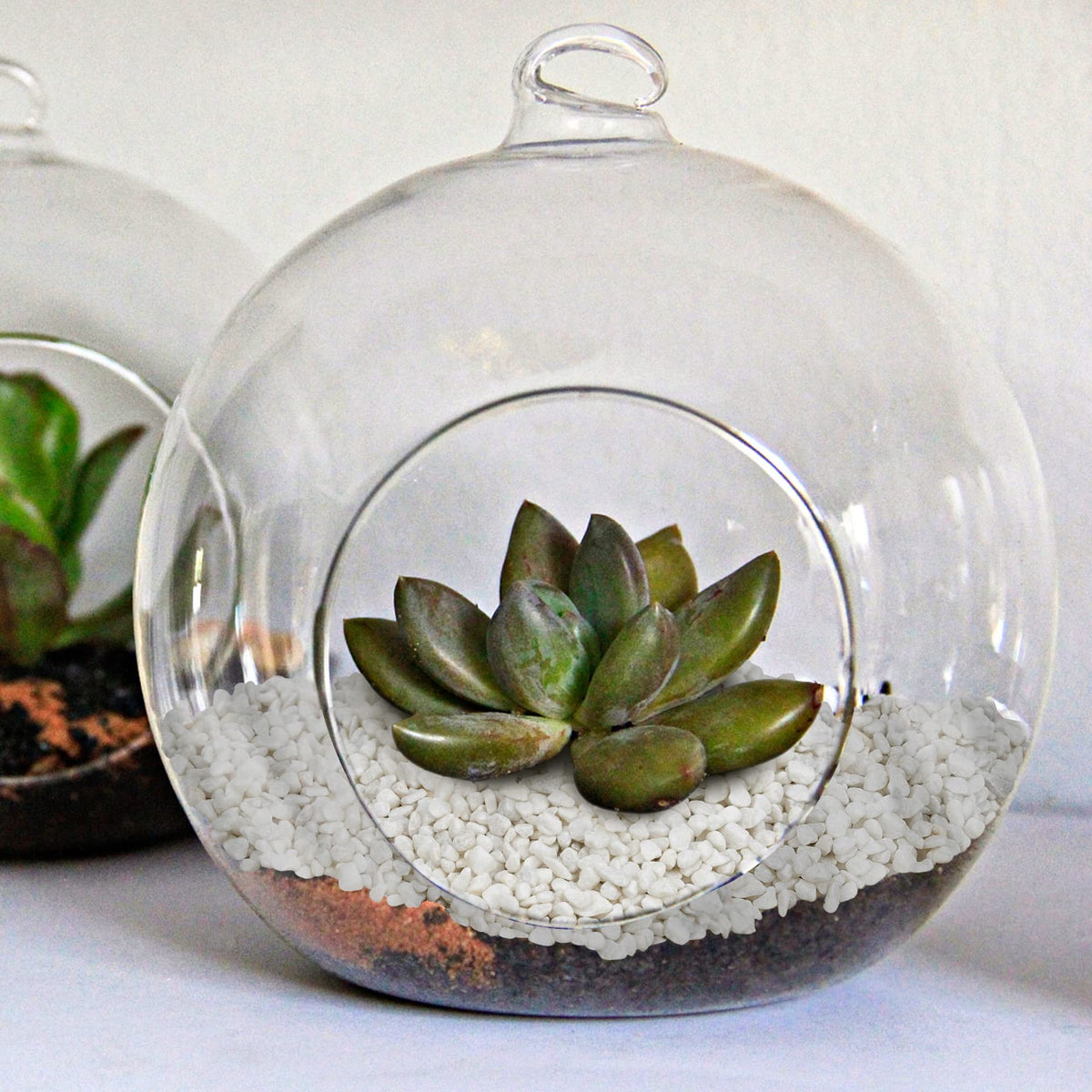 Mr. Fireglass white river rocks provide durable, low-gloss sparkle for decor.