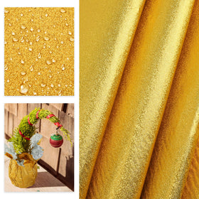 MR FIVE dual-sided foil with silver interior and gold exterior enhances wrapping elegance.