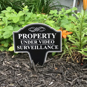 Front display presents a classy, readable warning about video surveillance