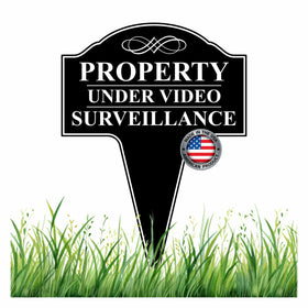 MRC Wood Products property sign under video surveillance, front view signals monitored property