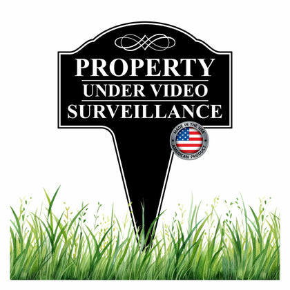 MRC Wood Products property sign under video surveillance, front view signals monitored property