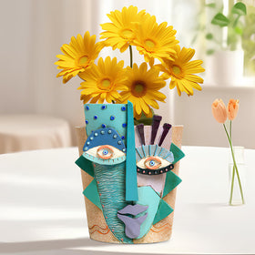 Mrlikale abstract face planter suitable for outdoor patios and garden spaces.