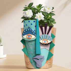 Mrlikale abstract face planter top-down view highlights artistic facial features.