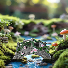 MUAMAX Miniature garden setup with arch bridge, sparks creative display ideas.