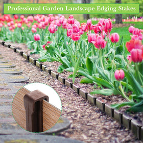 Mudder 10-inch plastic landscape stakes securing lawn edges and beds.