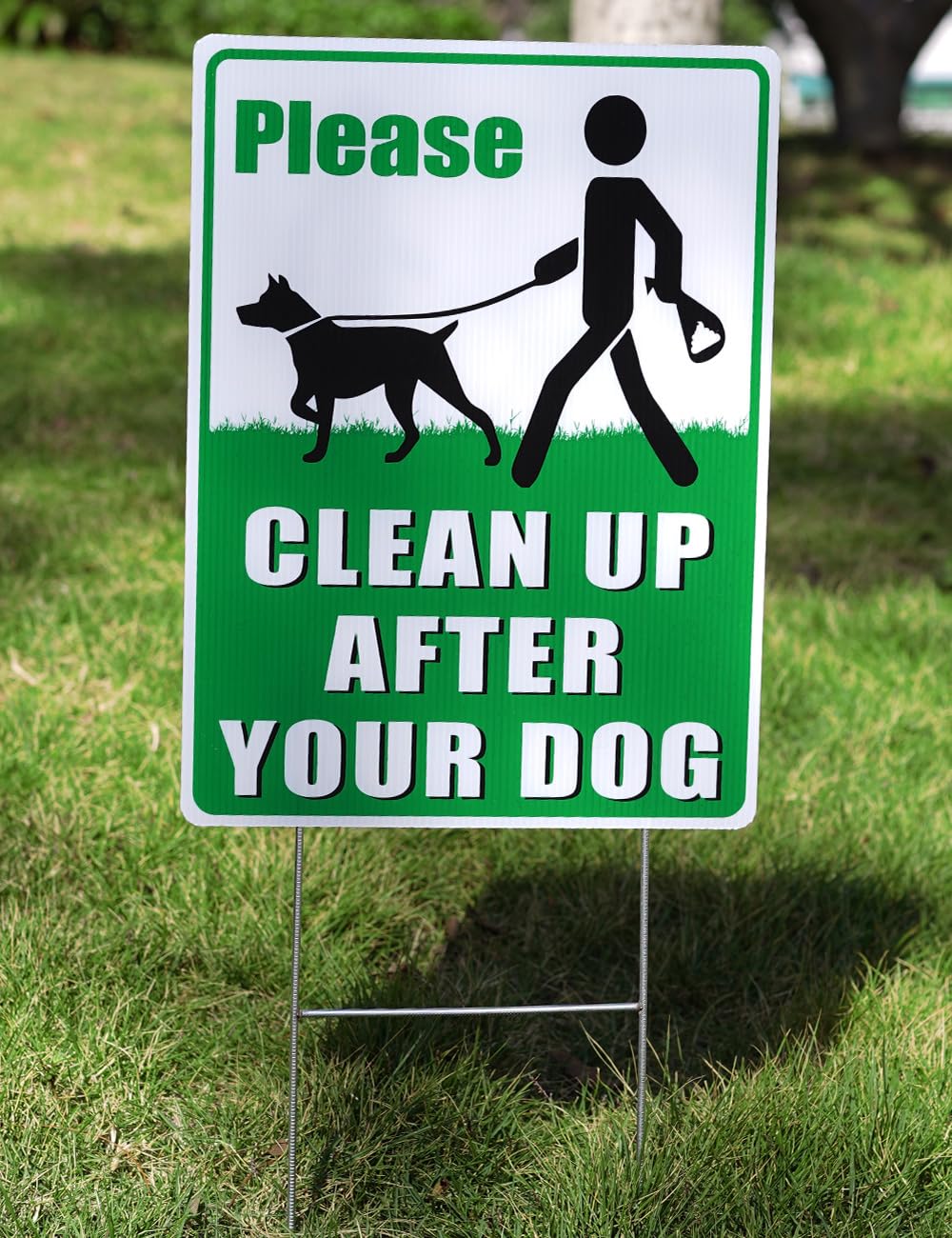 Multiwins yard sign promotes courteous dog owner behavior.