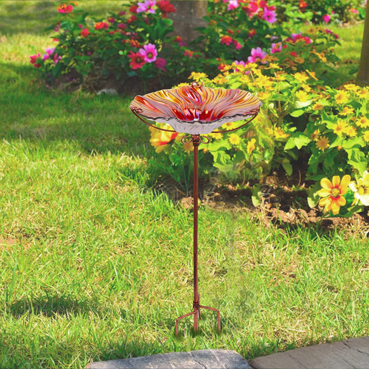 MUMTOP garden feature complements pots and flower beds.