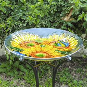 MUMTOP blue glass birdbath adds colorful yard decor.
