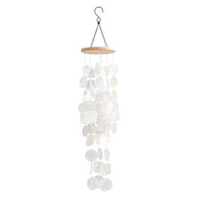MUMTOP Shell Wind Chimes shining in storefront displays by the beach.