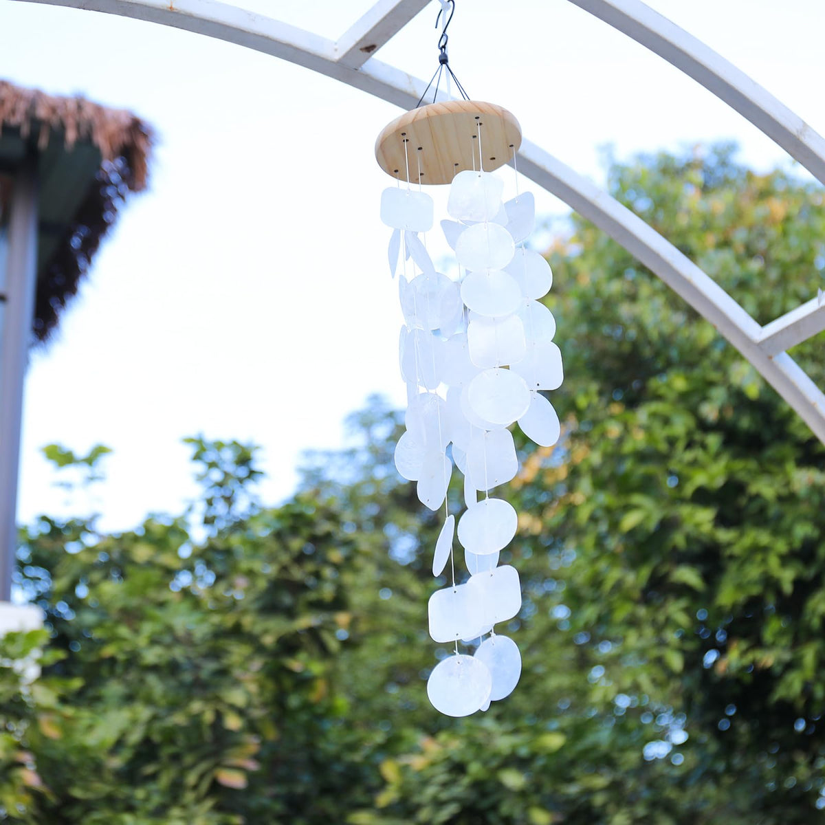 MUMTOP Shell Wind Chimes gracefully dancing with the wind in capiz design.