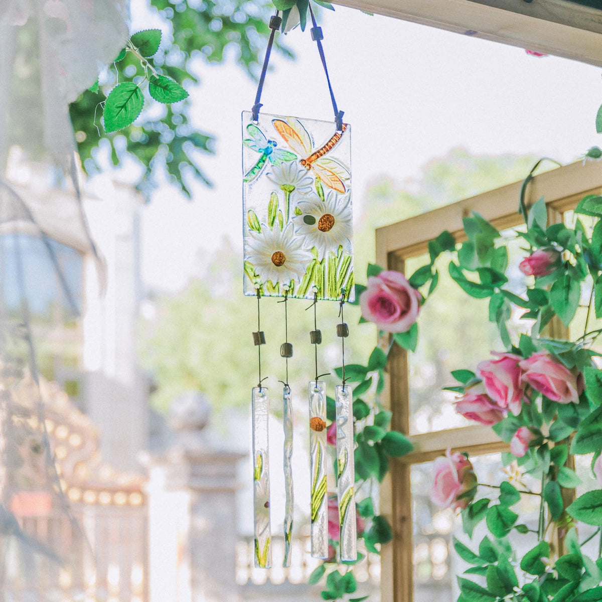 Dragonfly and daisy design provides charming outdoor decor and focal point