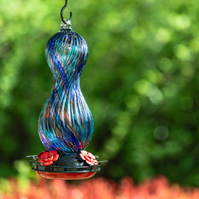 Muse Garden hand-blown glass feeder adds beauty while attracting hummingbirds.