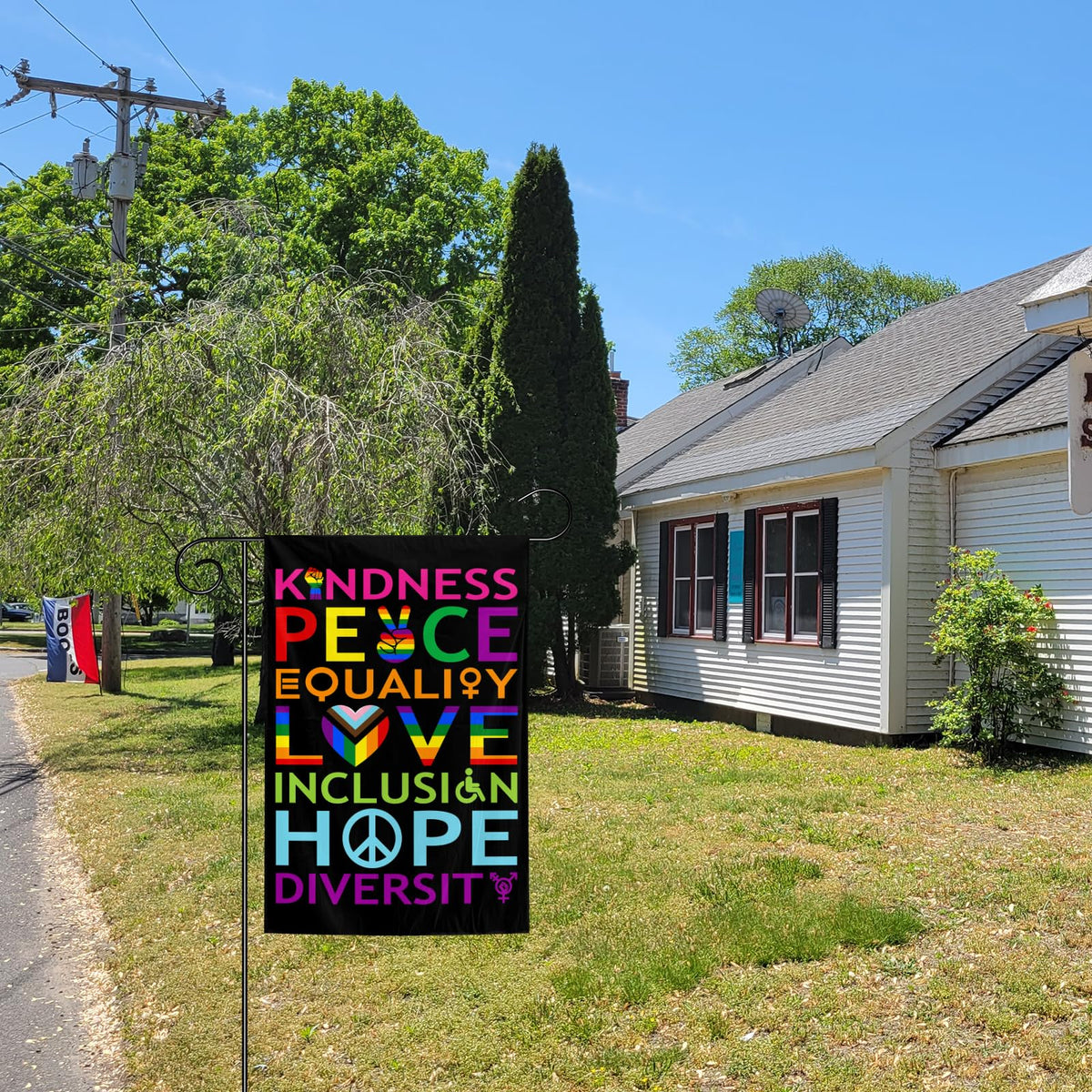 Gift-ready Muwodut Pride Garden Flag celebrating inclusion.