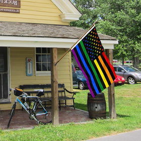 Muwodut Pride flag vibrant rainbow design for garden or balcony decor.