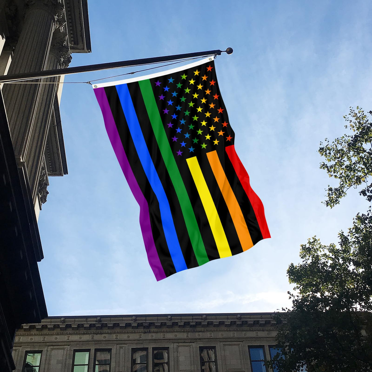 Muwodut Pride flag hanging on a flagpole for celebrations.
