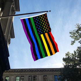 Muwodut Pride flag hanging on a flagpole for celebrations.