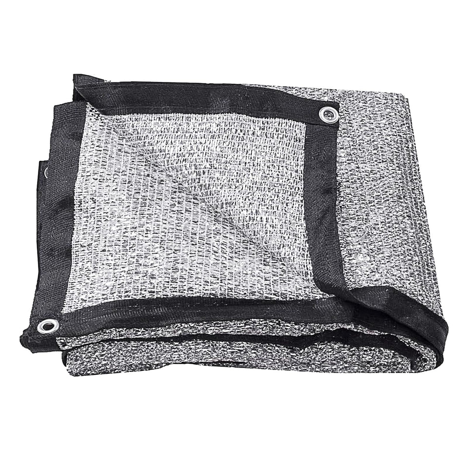 Mychoiii aluminet shade cloth over a greenhouse frame showing strong sun control