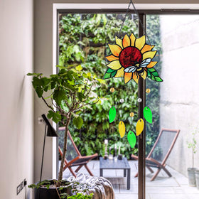 MYCRLIFE glass art filters daylight into warm window glow.