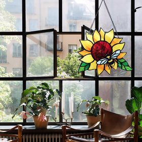MYCRLIFE hand-painted glass art enhances natural light with a warm glow.