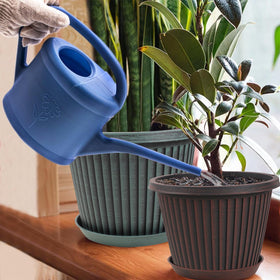 Myfeegoin 12-inch plastic planter on a sunlit balcony