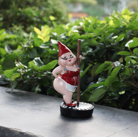 MYSTIC MANUSCRIPT steel pipe dancers dwarf statue on balcony creates playful ambiance