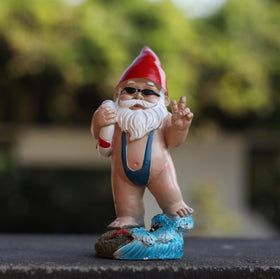 Mystic Manuscript Swimming Dwarf on porch display creates cozy spaces